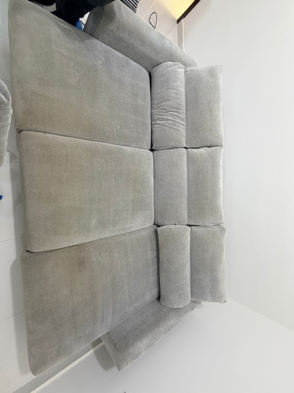 Restoring a stained fabric modular sofa in Al Mushrif, Abu Dhabi